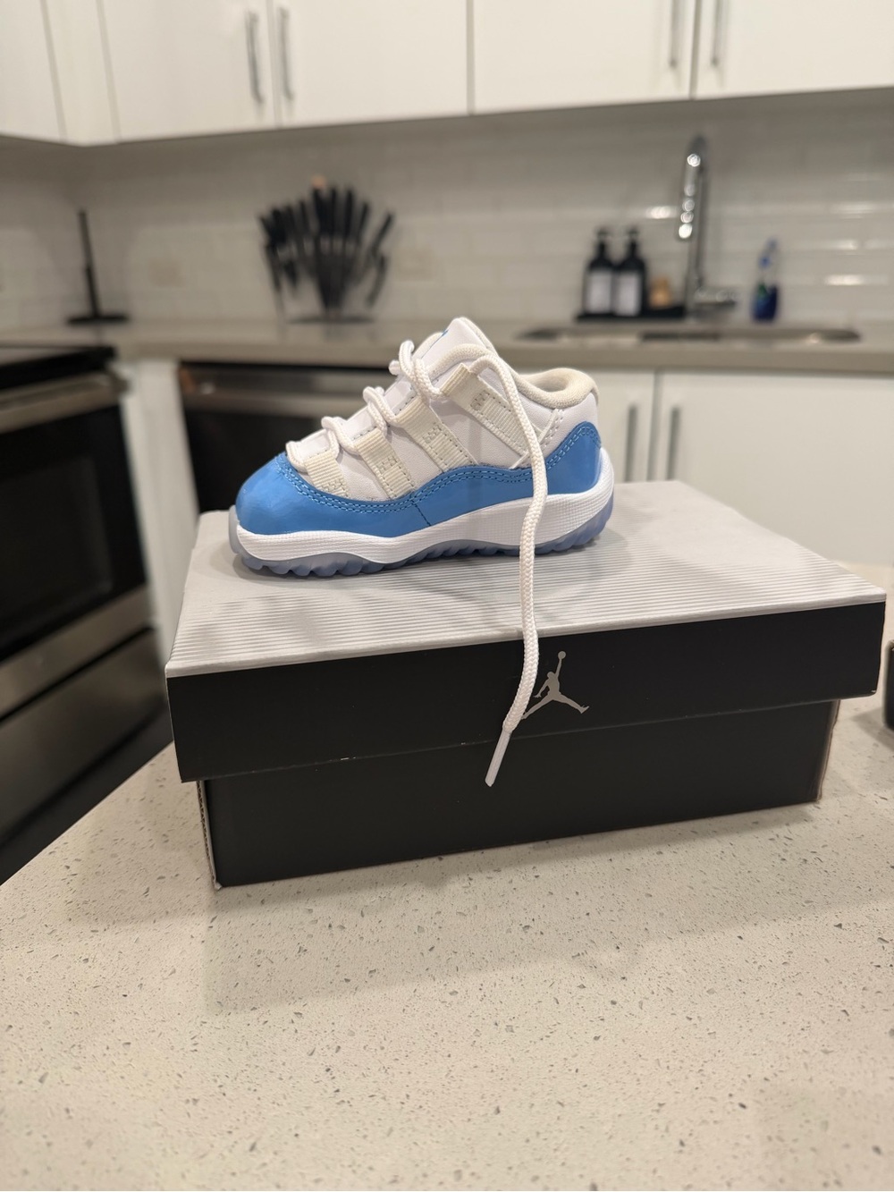 Jordan Kids Low-Top Sneakers in White and Light Blue